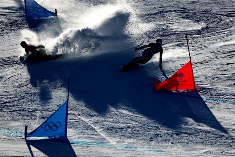 Infografica che mostra il dominio italiano nello snowboard alpino con statistiche sulle vittorie