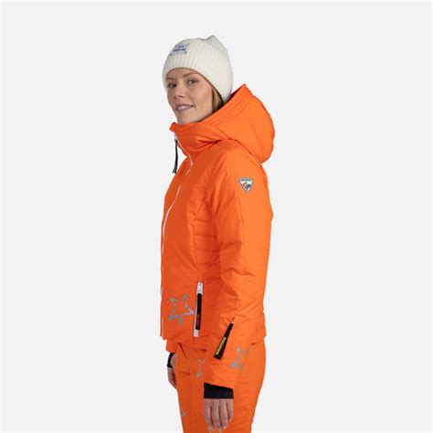Donna con giacca da sci JCC Stellar arancione Rossignol sulle piste