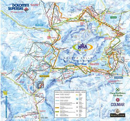 Mappa stilizzata con i percorsi arancione (orario) e verde (antiorario) del Sellaronda