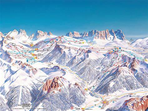 Panoramica del Passo San Pellegrino con prati verdi e montagne circostanti