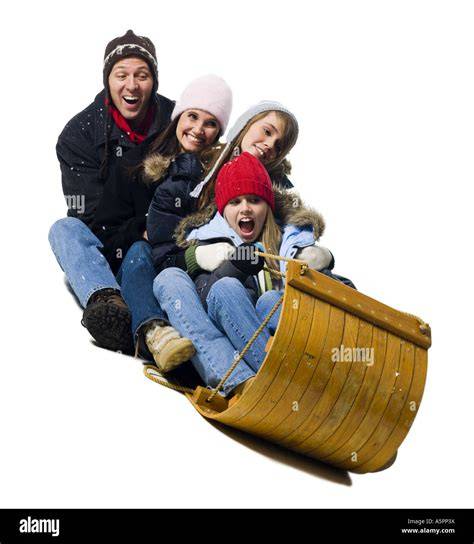 Famiglia che si diverte sulla pista da slittino a Oberaudorf-Hocheck