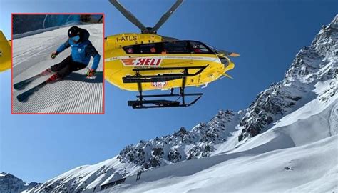 sciatore esperto che esegue un salto in una pista innevata a Madesimo