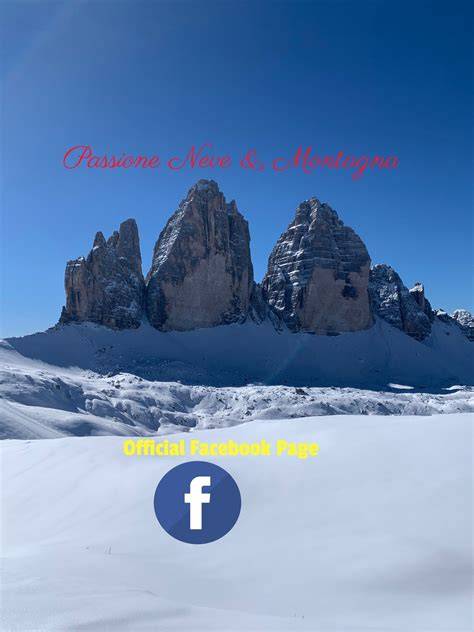 Sci-alpinisti che risalgono un pendio nevoso verso il Passo del Frate
