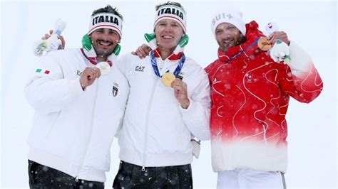 Foto di Simone Deromedis e Federico Tomasoni sul podio dopo la vittoria a Livigno.