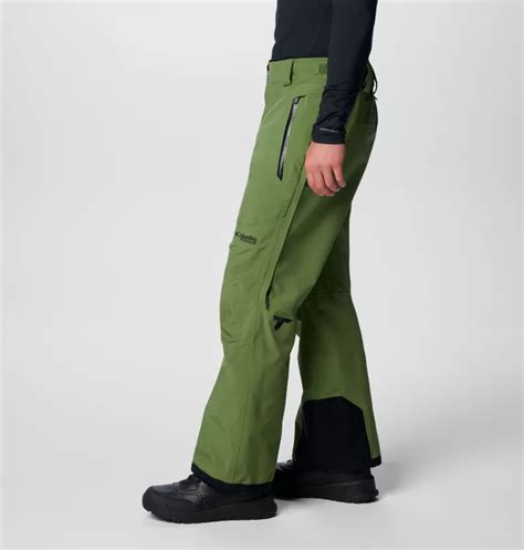 Vista laterale dei pantaloni Columbia Platinum Peak II 3L con dettaglio delle ghette e delle zip