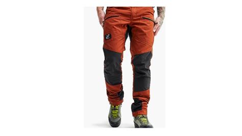 Schema che illustra le diverse tipologie di pantaloni da montagna e i loro utilizzi specifici.