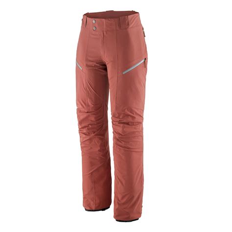 Schema di un pantalone da sci Patagonia con evidenziate le caratteristiche tecniche come cerniere di ventilazione, rinforzi e riflettore RECCO.