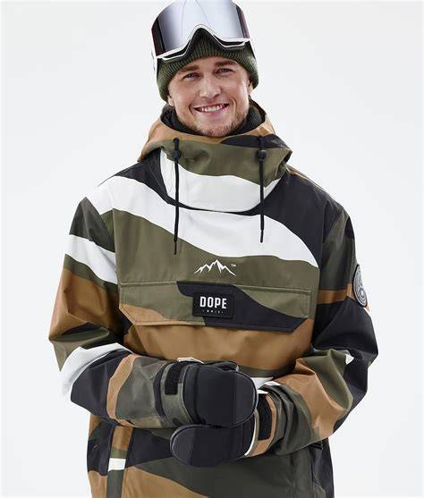 Dettaglio di una giacca da snowboard Billabong che mostra la ghetta antineve e la tasca per lo skipass