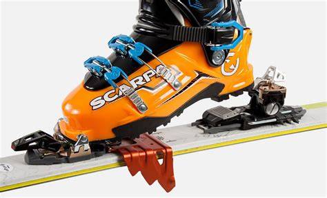 Schema che illustra le differenze tra attacchi da sci alpinismo con pin, a telaio e ibridi.