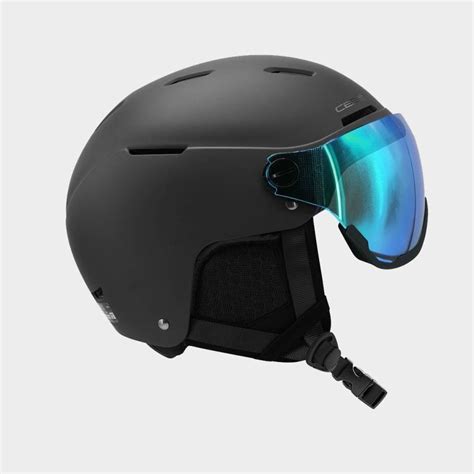 Bambino che indossa un casco da sci blu con visiera integrata
