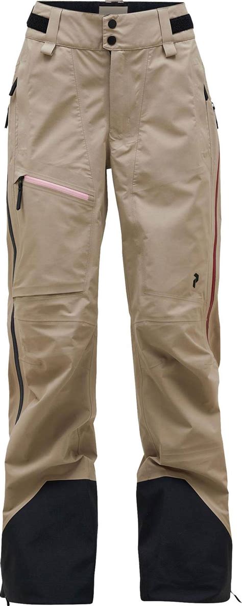 Esempio di abbinamento tra giacca e pantaloni da sci Peak Performance in colori neutri