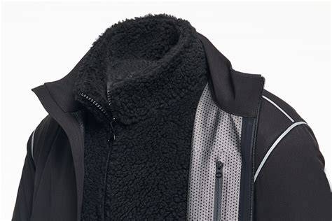 Schema dei diversi strati di tessuti tecnici per abbigliamento outdoor, evidenziando impermeabilità, traspirabilità e isolamento