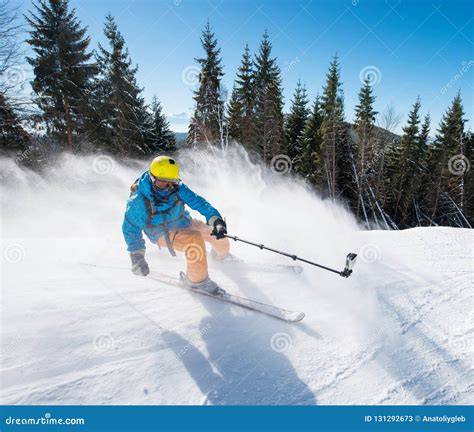 Sciatore con pantaloni Eider in azione